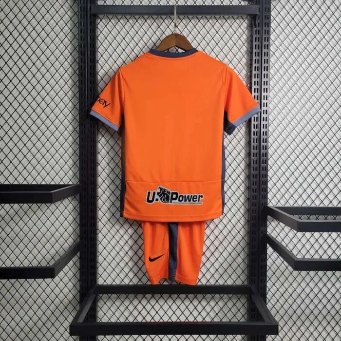 KIDS INTER MILAN 2324 THIRD ORANGE FOOTBALL KITShirtShorts - Official