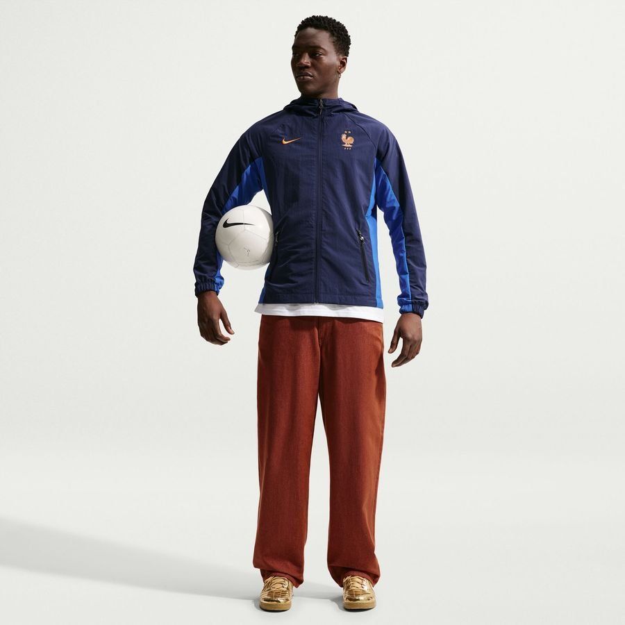 France Training Jacket Dri-FIT AWF Woven World Cup 2026 - Blackened Blue/Game Royal/Metallic Copper