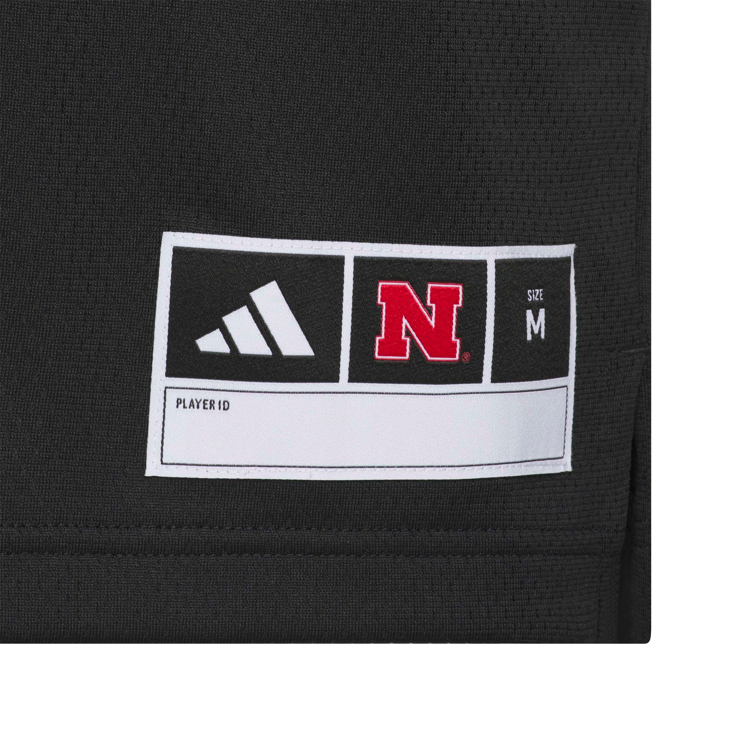 Youth #1 Black Nebraska Huskers Our Red Burns Brighter Strategy Football Jersey