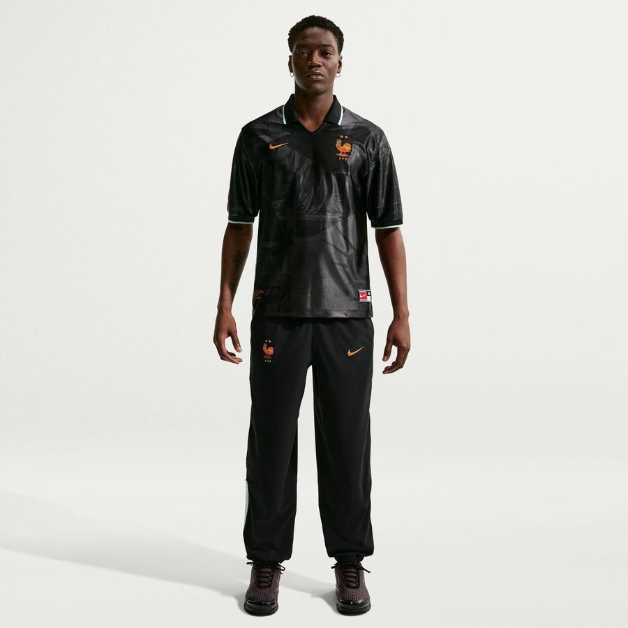 France Track Pants Dri-FIT Energy Woven World Cup 2026 - Black/Igloo/Metallic Copper