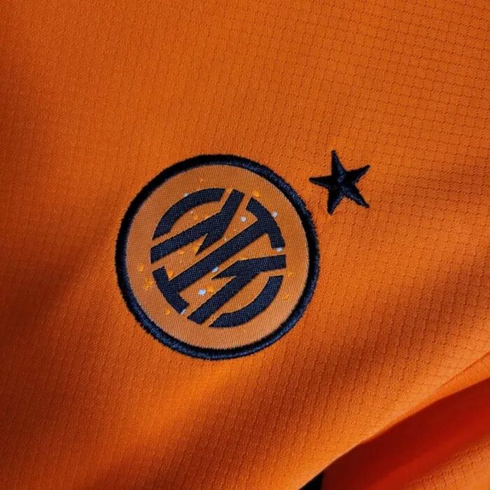 KIDS INTER MILAN 2324 THIRD ORANGE FOOTBALL KITShirtShorts - Official